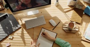 Student blogging from home with laptop